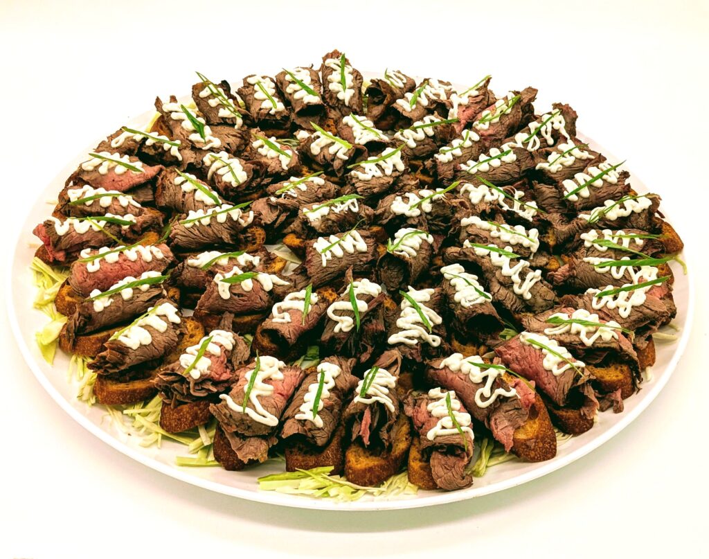 Crostini platter with steak and horseradish aioli